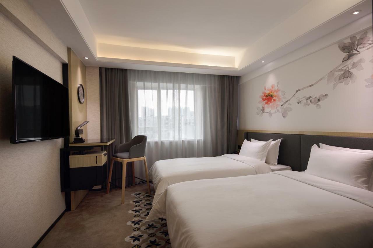 Paco Hotel Guangzhou Jiangtai Road Metro Branch Экстерьер фото