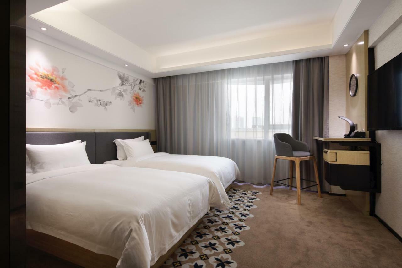 Paco Hotel Guangzhou Jiangtai Road Metro Branch Экстерьер фото